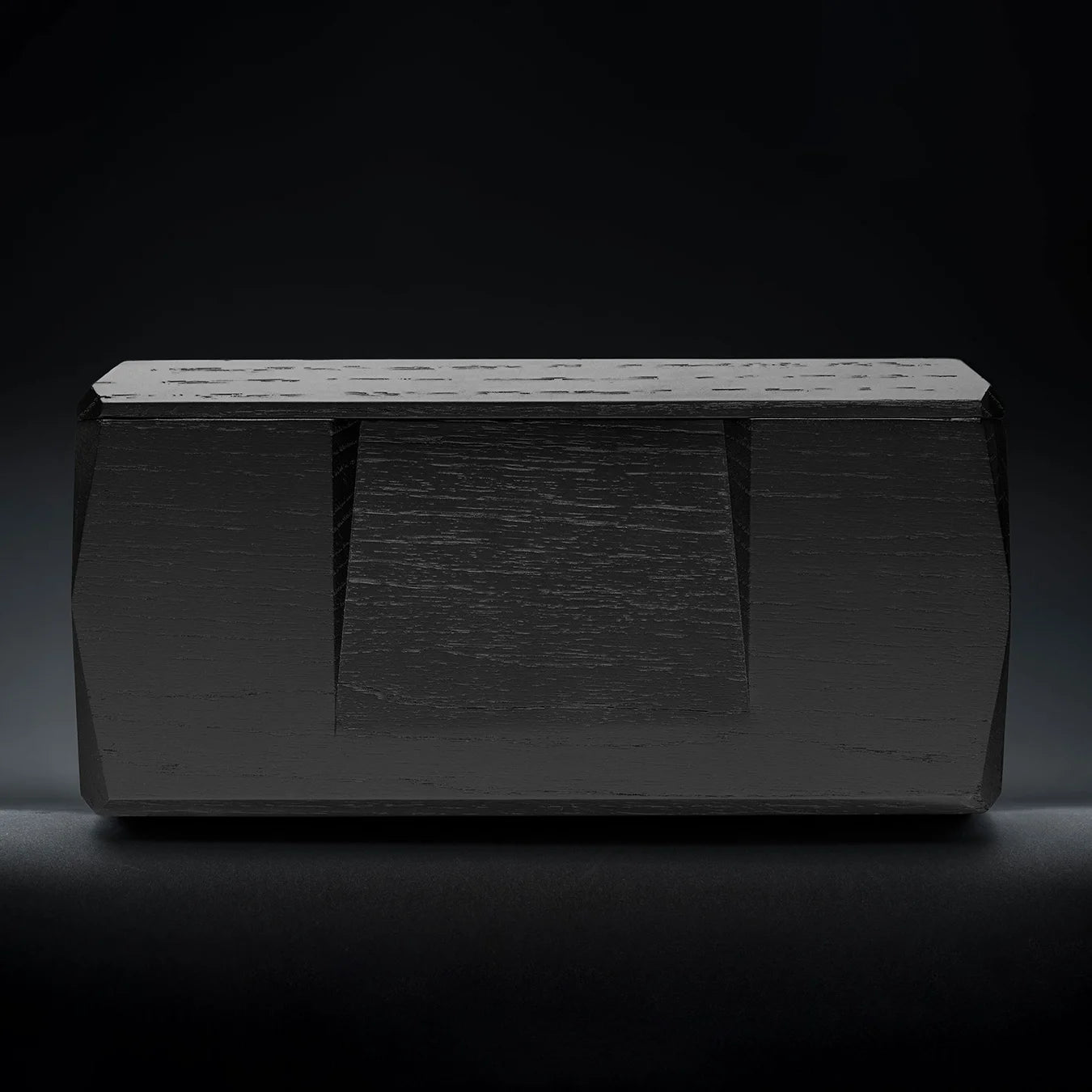 Side view of Kist Storage Case, crafted from black lacquered oak to hold two Norlan Whisky Glasses, elegant storage solution