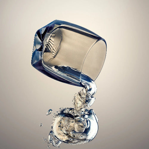 A unique lifestyle image of the rauk heavy tumbler in which the tumbler has been plunged into a pool of water and then photographed at the moment it's submerged - capturing it's decent in a captivating image in which the tumbler appears to be floating