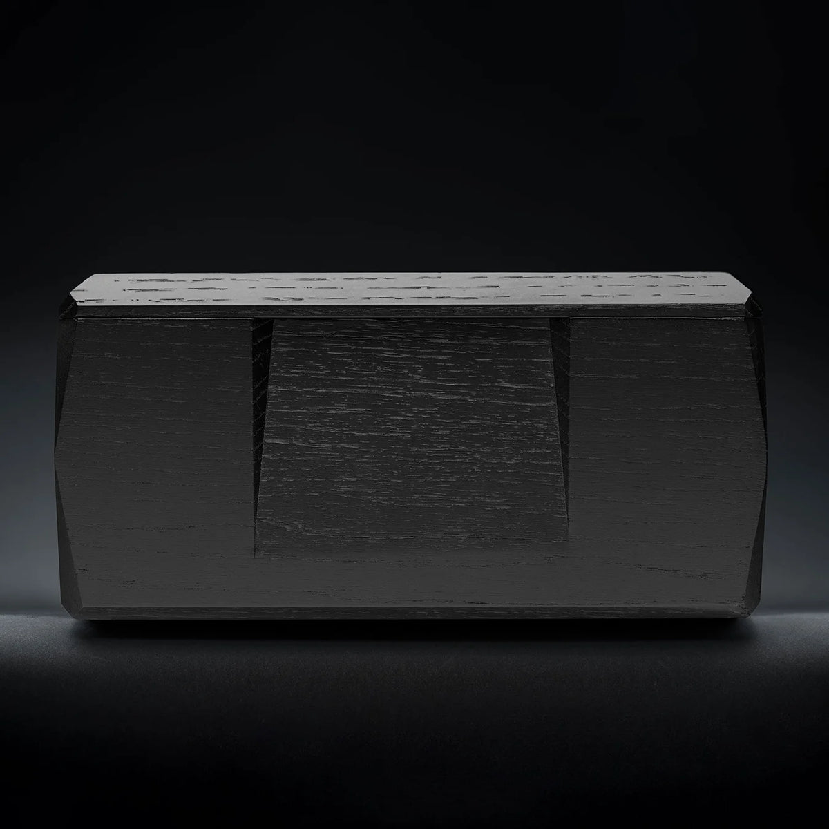 Side view of Kist Storage Case, crafted from black lacquered oak to hold two Norlan Whisky Glasses, elegant storage solution