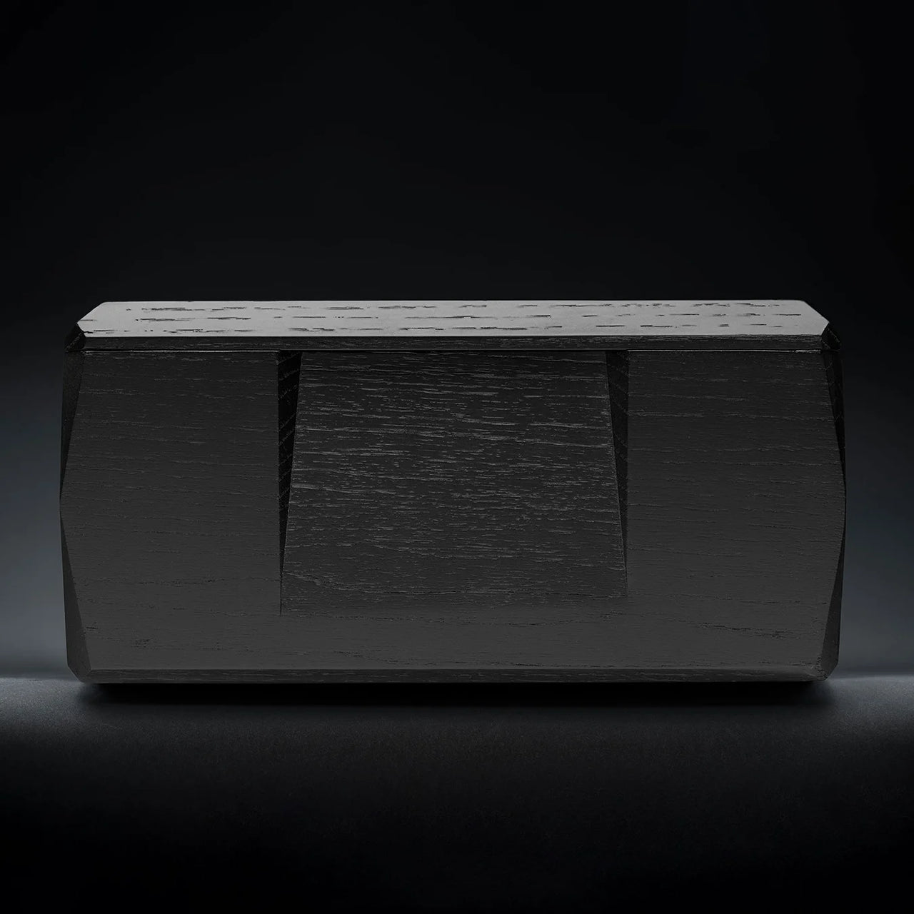 Side view of Kist Storage Case, crafted from black lacquered oak to hold two Norlan Whisky Glasses, elegant storage solution