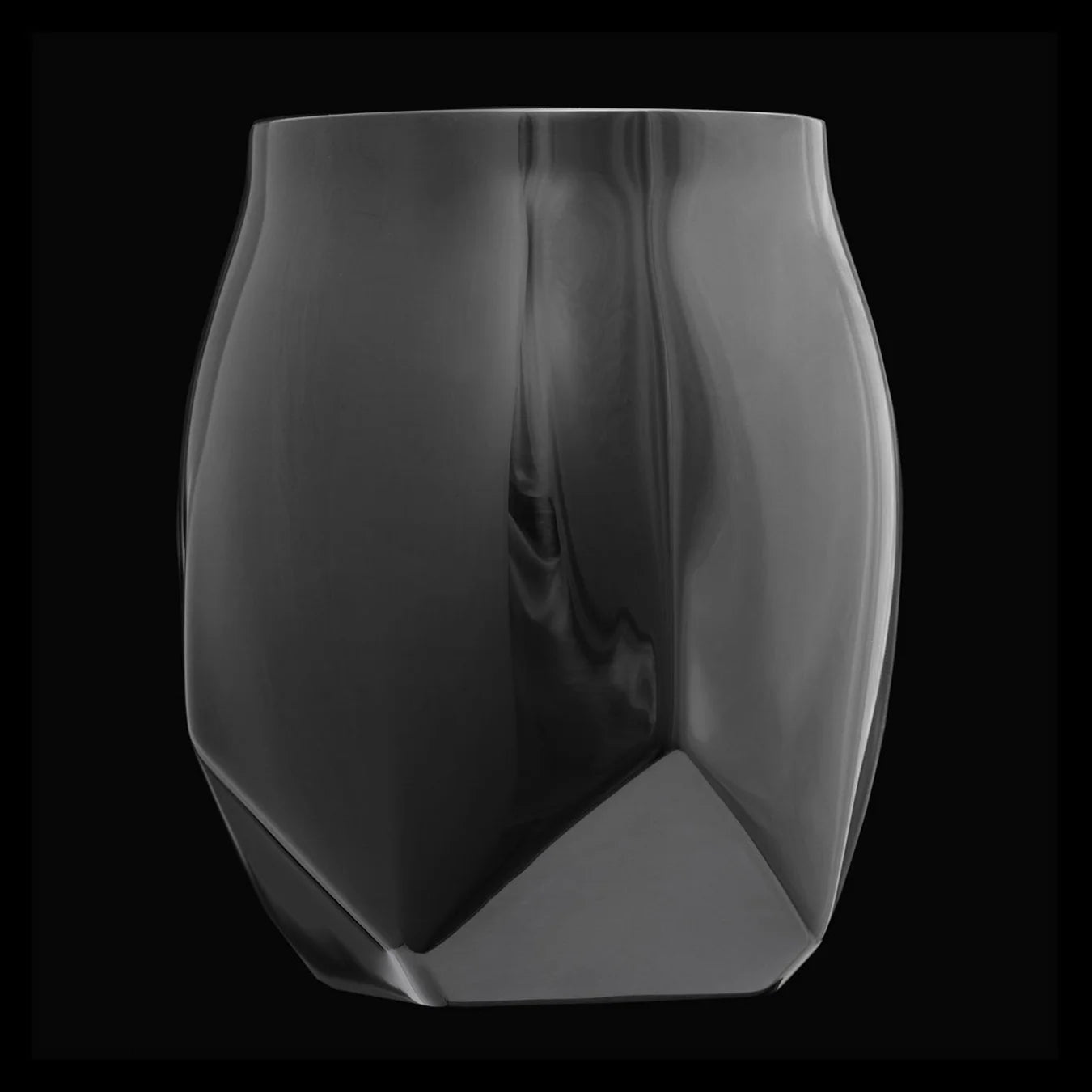 Rotated view of Norlan Steel Tumbler with faceted edges and mirror black PVD finish, ideal for sipping whiskey or spirits outdoors