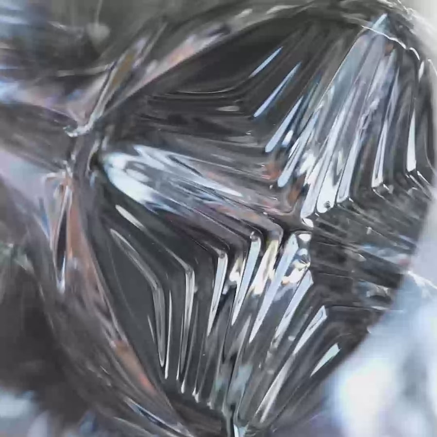 Clip of the Norlan's Rauk Heavy Tumbler showing a close-up of the chevron base pattern on the bottom of the glass designed to grip slippery ingredients for in-glass muddling. 