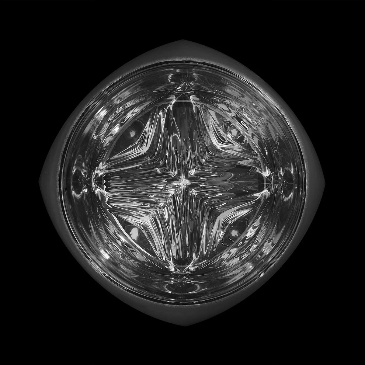 Rauk Heavy Tumbler in matte black with mirrored interior, designed to reflect light and enhance the appearance of whiskey or bourbon